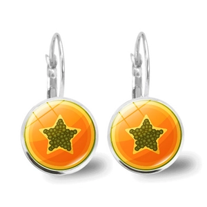 Detail view of lever-back earrings with orange fruit slice pattern and star design