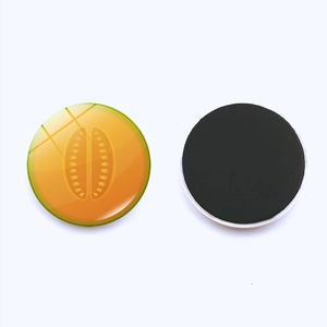 Round crystal glass fridge magnet with yellow fruit slice pattern and soft magnetic back