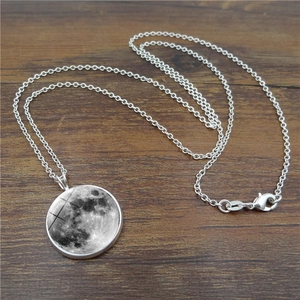 Luminous moon pendant necklace with realistic lunar surface and fine silver chain