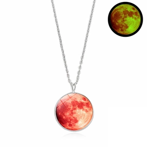 Luminous moon necklace detail showing the red planet pendant and green glow in the dark effect