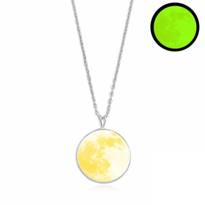 Detailed close-up of luminous moon pendant with glowing green texture on silver chain