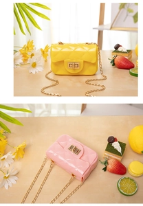 Detail of mini quilted jelly bags in yellow and pink with gold twist locks and chain straps