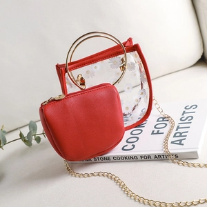 Sac transparent à motif marguerite rouge avec poignée dorée et bandoulière chaîne