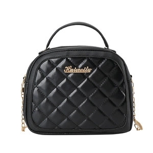 Women's black quilted crossbody bag with gold chain strap and metal logo detail