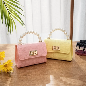 Mini crocodile pattern jelly bag with pearl handle in pink and yellow colors
