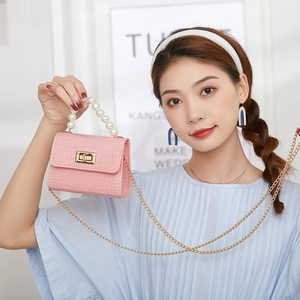 Pink crocodile-embossed mini jelly bag with pearl handle and gold chain strap for women