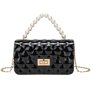 Quilted black jelly handbag with pearl handle and gold chain strap for women