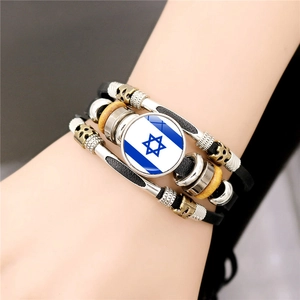 Multilayer leather bracelet with Israel flag glass dome on model's wrist