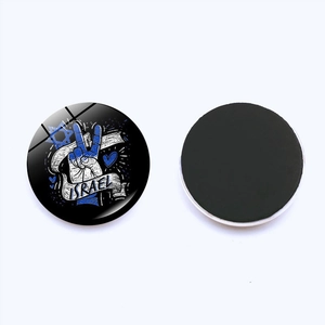 Detail of round 25mm Israel flag crystal glass fridge magnet with magnetic backing