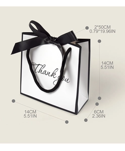 Detailed dimension guide for small white gift bag with black bow and Thank You print