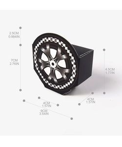Macro detail of DIY tire-shaped candy boxes with racing flag patterns and wheel hub design