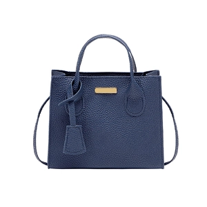 Navy blue lychee texture square handbag with dual handles and long shoulder strap