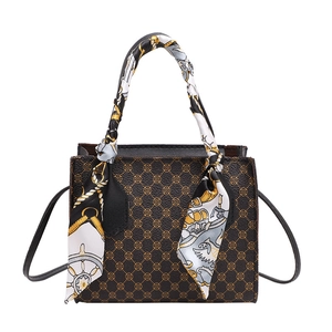 Retro Boston handbag with silk scarf handle and brown geometric pattern on dark leather