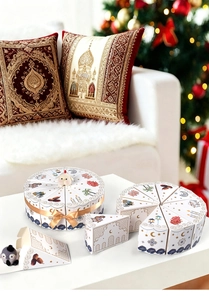 Detail of triangle cake-shaped gift boxes with Islamic motifs and 3D bird ornaments