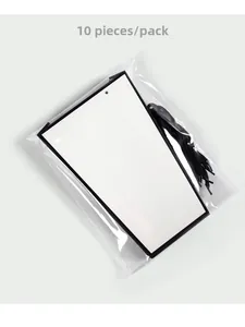 Detail view of 10pcs white gift cards with black borders and ropes in clear plastic packaging
