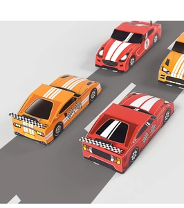 Detail of red and orange cartoon race car treat boxes with checkered flags on race track