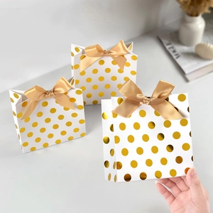 Mini gift bag with gold foil polka dots and satin bow for jewelry packaging, 10-piece pack