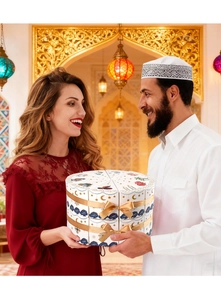 Close-up of triangle cake gift boxes with golden ribbons for Ramadan party favors