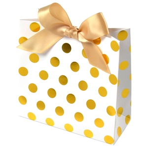 Elegant white paper gift bag with golden polka dots and champagne satin bow decoration