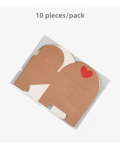Detail of 10 pack elephant shaped kraft paper gift tags with small red heart accent