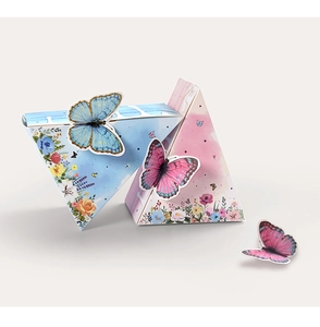Detailed close-up of 3D butterfly gift boxes with floral patterns in blue and pink hues