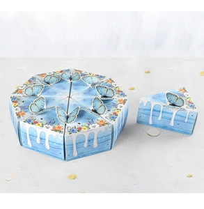 Close-up of 3D butterfly cake shaped gift boxes with blue floral and cream patterns