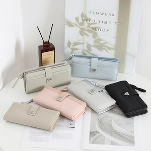Long PU leather wallets for women with heart buckle and wristlet strap in various colors