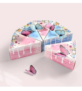 Detail of triangle cake favor boxes with butterfly and floral prints for parties