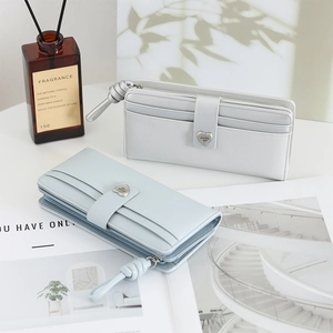 Detail view of long PU leather wallets with heart buckle and multi-card slot design