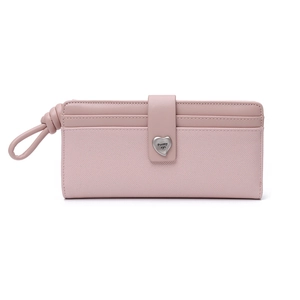 Detail view of pink long wallet featuring heart metal clasp and cross-grain texture