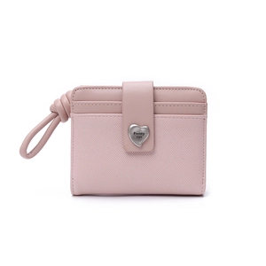 Detail of light pink small wallet with heart-shaped metal buckle and lychee texture grain