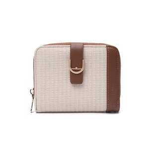 Close-up of dual-tone women's wallet with woven texture and metallic U-shaped buckle
