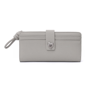 Detailed view of grey Saffiano texture long wallet with heart-shaped metal clasp and wrist strap