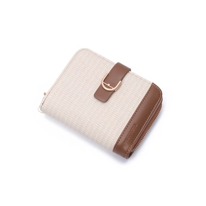 Detail view of woven fabric wallet with leather trim and gold D-ring buckle