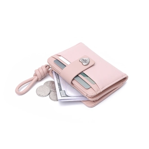 Pink PU leather folding wallet showing card slots and heart buckle with wrist strap