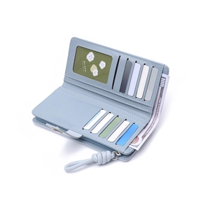 Detailed interior of a light blue long wallet with multiple card slots and photo window