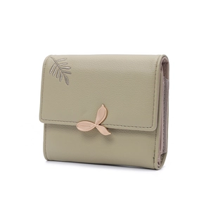 Detailed view of sage green matte PU leather wallet with delicate leaf embroidery