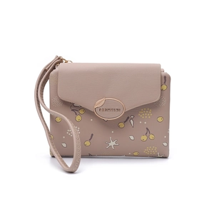 Close-up of pink PU leather wallet with cherry print and gold engraved metal clasp