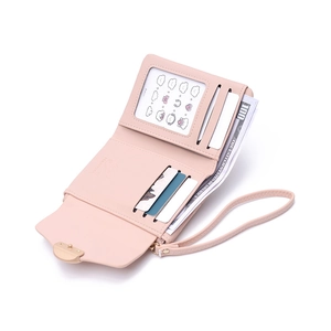 Detail view of pink PU leather wallet with card slots, ID window, and gold snap fastener