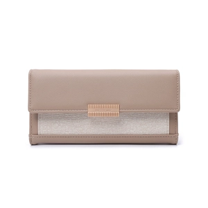 Detail of mocha leather wallet featuring a trifold design with a rose gold metal buckle