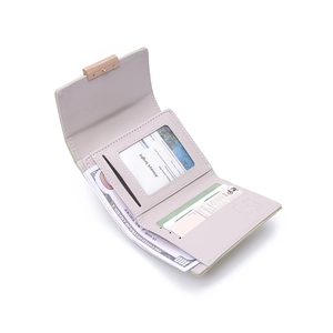 Detail view of tri-fold wallet interior with card slots, ID window, and currency pocket