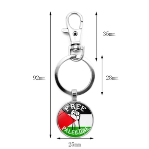 Porte-clés drapeau Palestine avec logo poing et dimensions 92mm de long et 25mm de pendentif