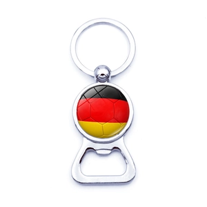 Detail of silver metal soccer bottle opener keychain with German flag colors and ball logo
