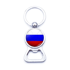 Close-up of metal football bottle opener keychain with Russia flag and chrome finish