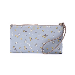 Close-up of floral long wallet with cherry print, zipper closure and wrist strap