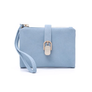 Detail of light blue faux suede wallet featuring a gold zip and branded metal buckle