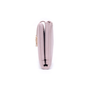 Detail view of pink PU leather wallet showing triple fold design and side stitching