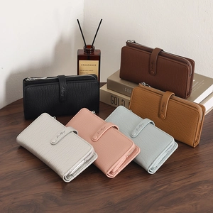 Women long wallet in multiple colors with pebbled texture and metal zipper closure