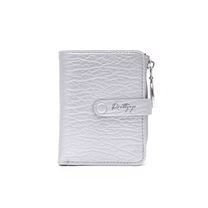 Detail of silver women's wallet showing litchi texture, snap button and metal zipper