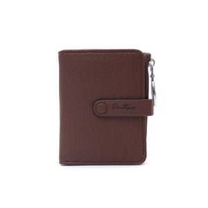 Detail of lychee pattern leather card holder with secure snap button and metal zipper